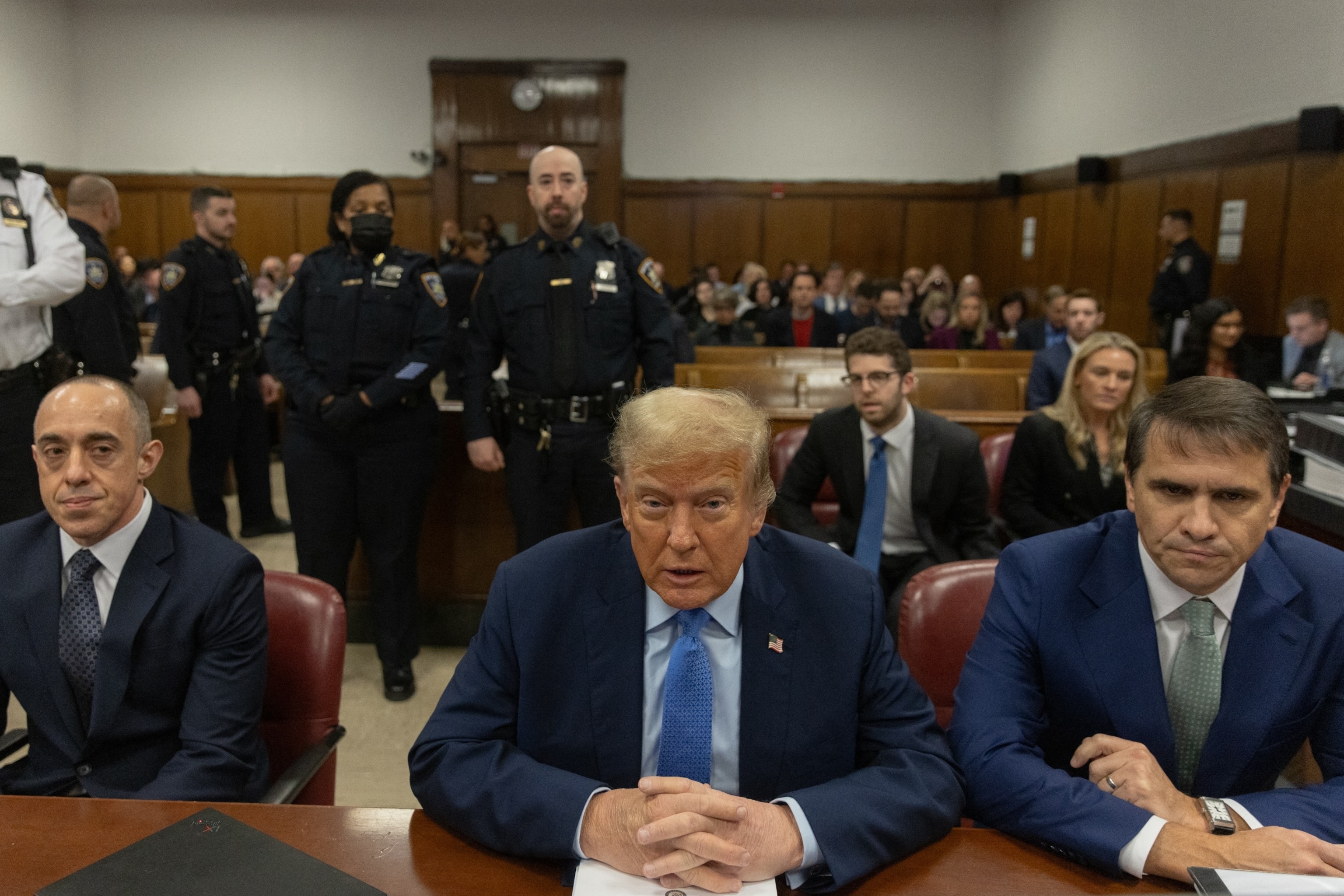 PHOTO: Former President Donald Trump (C), sitting with attorneys Emil Bove (L) and Todd Blanche (R), attends his trial at Manhattan Criminal Court in New York City on April 26, 2024.