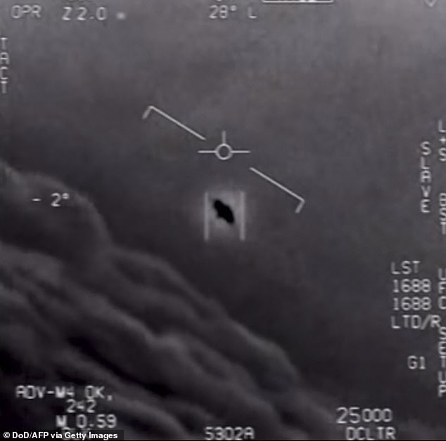 At least six whistleblowers claim they worked on Roswell-style UFO crash retrieval and reverse engineering programs and have spoken to members of congress. This video grab shows part of an unclassified video taken by Navy pilots that have circulated for years showing interactions with 'unidentified aerial phenomena'