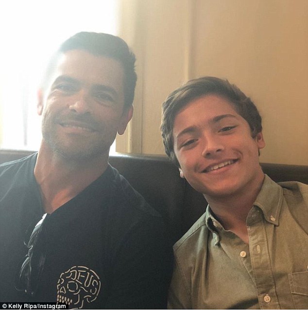 Dad and son: Joaquin, now 15, posing with dad Mark