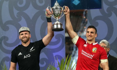 Kieran Read and Sam Warburton lift the series trophy after the match.