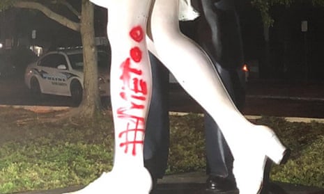 Vandalism to Unconditional Surrender statue, with ‘#MeToo’ painted on the leg.