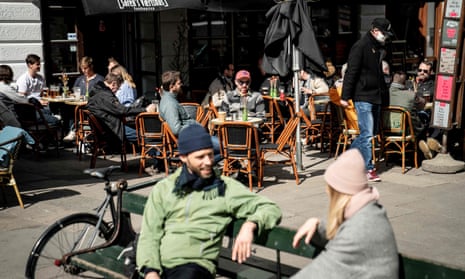 Customers enjoy outdoor service in Copenhagen on 21 April, when the ‘coronapas’ was introduced. 