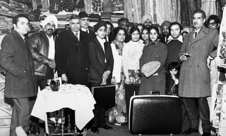 28 Southall Punjabis at the opening of one of one of its first textile stores circa 1970