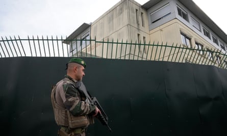 A soldier patrols outside a Jewish school in Créteil, in the suburbs of Paris, on Monday.