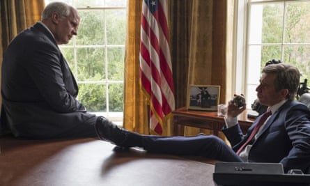 Christian Bale as Dick Cheney, left, and Sam Rockwell as George W Bush in a scene from Vice.