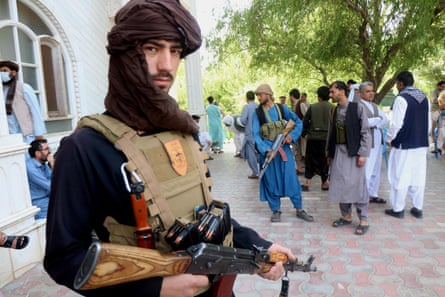 Armed supporters of former Mujahideen commander Ismail Khan, guards his residence during a gathering to devise strategies for the defence of their region as they vow to fight side-by-side with Afghan security forces in Herat, Afghanistan, 09 July