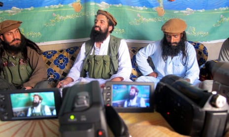 Shahidullah Shahid, centre, then spokesman of the Pakistani Taliban, speaks to reporters in February