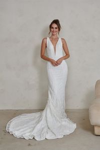 modern boho wedding gown || embroidered sheet lace wedding gown || plunge neckline wedding gown || fit and flare silhouette || elegant wedding gown 