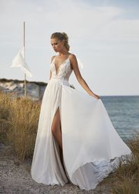 chic romantic bride || lace dress with a double split chiffon overskirt || beach wedding dress || beaded bodice features a deep v-neckline and fine beading on the thin straps