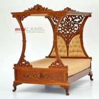 Made of wood, finished in walnut. mattress is loose. Four pillows included. Carved headboard with padded upholstery.Beautiful wooden carved top of bed. 7-1/4"(L) x 5-1/8"(W) x 6-13/16"(H)