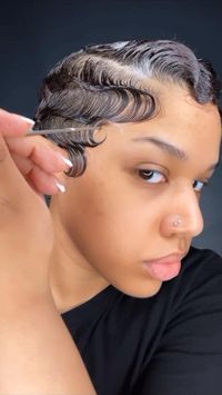 Check out 50 more cute short hairstyles for black women featuring finger waves, teeny weeny afros & more.