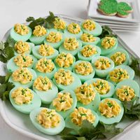 Green devilled eggs for St Patrick's Day party. Really simple - all you need is some food colouring!