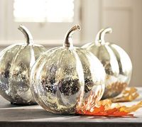 'Looking glass' spray can transform pumpkins into these gorgeous centerpieces! Use a white spray first to get the best effect. Try this with dollar store pumpkins. Krylon K09033000 Looking Glass Mirror-Like Aerosol Spray Paint, 6-Ounce.