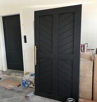 Oh my gaaaaa! We had these doors made for our laundry room and master bath. So pumped to get them hung. Talk about a statement piece. Shout out to Brad @littlehumblehouse for building these for us. We have been working with him for months on these designs and seeing them in person... all the feels #barndoor #blackdoors