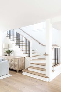Pure Salt Interiors | Costa Mesa Project | Living Room | #homedesign #interiordesign #livingroom #livingroomideas #livingroomfurniture #livingroomdecor #furniture #stairs #staircase #designinspo #homedesign #coastalliving #coastalinspo