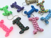 Cute dog bone keychains! Add some fun to your keychain with our unique keychains made from paracord 550. These cute keychains make a great bag charm or chunky zipper pull.   Please reach out if you have any questions! More to explore from Knot Your Average Shop! Entire KYA Shop : bit.ly/ShopKYA Zipper Pulls: bit.ly/KYAZipperPulls Heavy Duty Leashes: bit.ly/KYAHeavyDuty -----ABOUT PARACORD----- Paracord550 is a lightweight yet extremely strong nylon rope that can last for years. Popular with surv