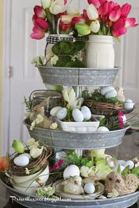 Take all your Easter decorations and create an eclectic centerpiece like this Spring Galvanized Centerpiece. More Spring & Easter Home Decor Ideas on Frugal Coupon Living.
