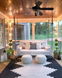 Rethink Your Outdoor Space by Channeling This Dreamy Porch Swing | Hunker #outdoordecor