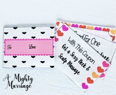 two coupons with hearts on them sitting next to each other in front of a white background