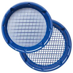 two blue frisbees sitting next to each other