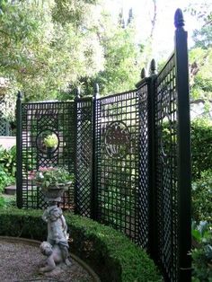 .I love a black fence, I would still like to do one in my yard Lattice Fence, Garden Trellis, Garden Gates, Pergola Patio, Garden Arbor, Garden Fencing, Garden Screening, Patio Garden, Garden Room