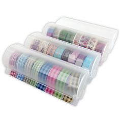 several rolls of washi tape are in a plastic container