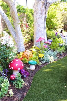 the garden is full of colorful mushrooms and plants