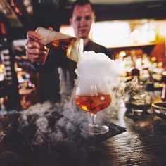 At The Hinds Head, we have added a Heston twist on the 1800s cocktail, the Rum Old Fashioned. Ingredients include Atlantico Platino rum and El Dorado 5-year-old Gold rum with whiskey barrel-aged bitters and grapefruit zest, finished with a demerara cloud. Visit The Hinds Head, Bray to try our great variety of cocktails. #Heston #HestonBlumenthal #HindsHeadBray #Bray #RumOldFashioned #Cocktail  Photo credit: @joesarahphoto Whiskey, Alcoholic Drinks, Rum, Whiskey Barrel, Rum Old Fashioned, Gold Rum, Cocktail, Old Fashioned
