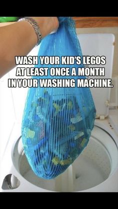 someone is holding a laundry bag in front of a washing machine that says, wash your kids's legos at least once a month in your washing machine
