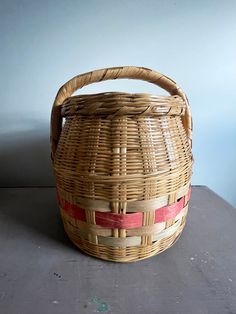 a woven basket sitting on top of a table