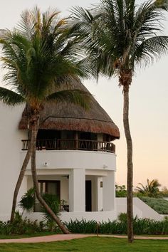 The Maroma hotel is housed within rounded stucco, palapa-topped volumes. Exterior, Boutique Hotel, Yucatan Peninsula, Mexico Hotels