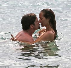 Hipster hair: At one stage Morgan swam up to her A-list boyfriend for a kiss...