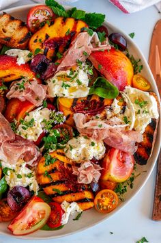 Grilled Nectarine Burrata Prosciutto Salad - The best way to enjoy juicy summertime nectarines, grilled up with cherries, tomatoes, burrata cheese, sliced prosciutto, drizzled with a lemon herb vinaigrette. From aberdeenskitchen.com #grilled #nectarine #tomatoes #cherries #burrata #prosciutto #salad #lemon #herb #vinaigrette #summer #BBQ #recipe Bento, Yemek, Koken, Eten, Yum, Mad, Diner, Cuisine, Rezepte
