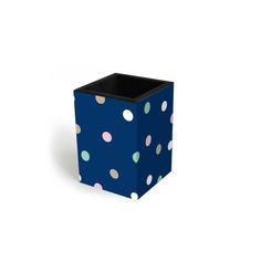 a blue box with multicolored polka dots on the front and sides, sitting upright against a white background