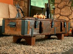 an old trunk coffee table with bells on it