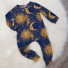 Introduce your little moon child to the world of celestial wonders with our Boho Baby Boy Romper! Drawing inspiration from the eclectic vibes of 90s bedding, this sun & moon printed romper is a harmonious blend of style, comfort, and hippy aesthetics, making it a standout piece in any baby boy's clothes collection. 🌞 Celestial Sun & Moon Print: Set the trend with this gorgeous one piece, featuring a captivating sun & moon print that embodies the free-spirited essence of boho and hippy baby clot Baby Boy Outfits, Toddler Romper, Baby Boy Romper, Baby Clothes, Baby Outfits Newborn, Hippie Baby Clothes