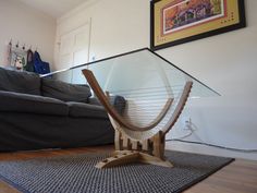 a harp sitting on top of a rug next to a couch