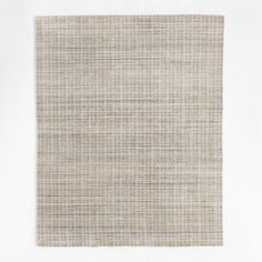 an area rug made out of woven fabric on a white surface with no one in it