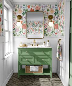a bathroom with a green vanity and floral wallpaper