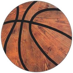 a basketball is shown on top of a wooden table with black lines around the rim