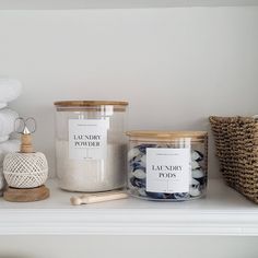 candles and other items are sitting on a shelf