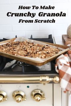 a pan filled with granola sitting on top of a stove
