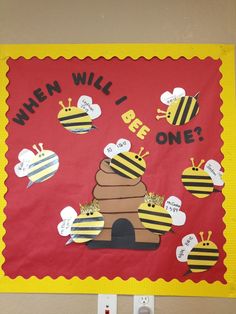 a bulletin board with bees on it that says when will i bee one?
