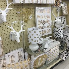 there are many decorative items on display in the store