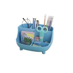 a blue desk caddy with pens, scissors and other office supplies in it on a white background