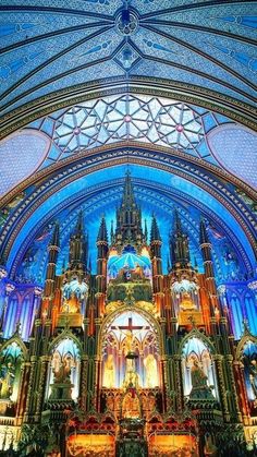 the inside of a cathedral with stained glass