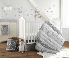 The Levtex Baby Everett 5 Piece Crib Bedding Set is a Babies R Us exclusive! This Grey and White Set features a variety of Woodland themed patterns, artistically pieced together to inspire the beauty of the great outdoors. The Everett 5 Piece Crib Bedding Set includes a Quilt, a 100% cotton Grey and White Fitted Crib Sheet with a Woodland Animal themed pattern, a Grey Canvas Dust Ruffle with embroidered White Chevron stripes, a Grey Diaper Stacker with a Deer Head print, and an over-sized arrow Woodland Baby Bedding, Cribs