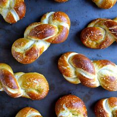 freshly baked breads on a baking sheet ready to be cooked in the oven or used as an appetizer