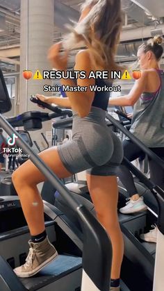 a woman is running on a treadmill while another person works out in the background