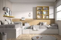 a bedroom with white furniture and wood flooring